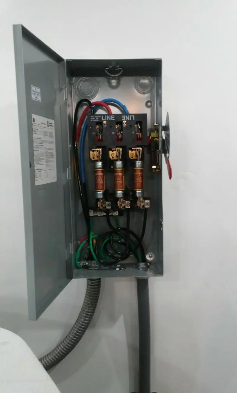 Three-phase disconnect switch installed for Smoke Detector Installation in Welch